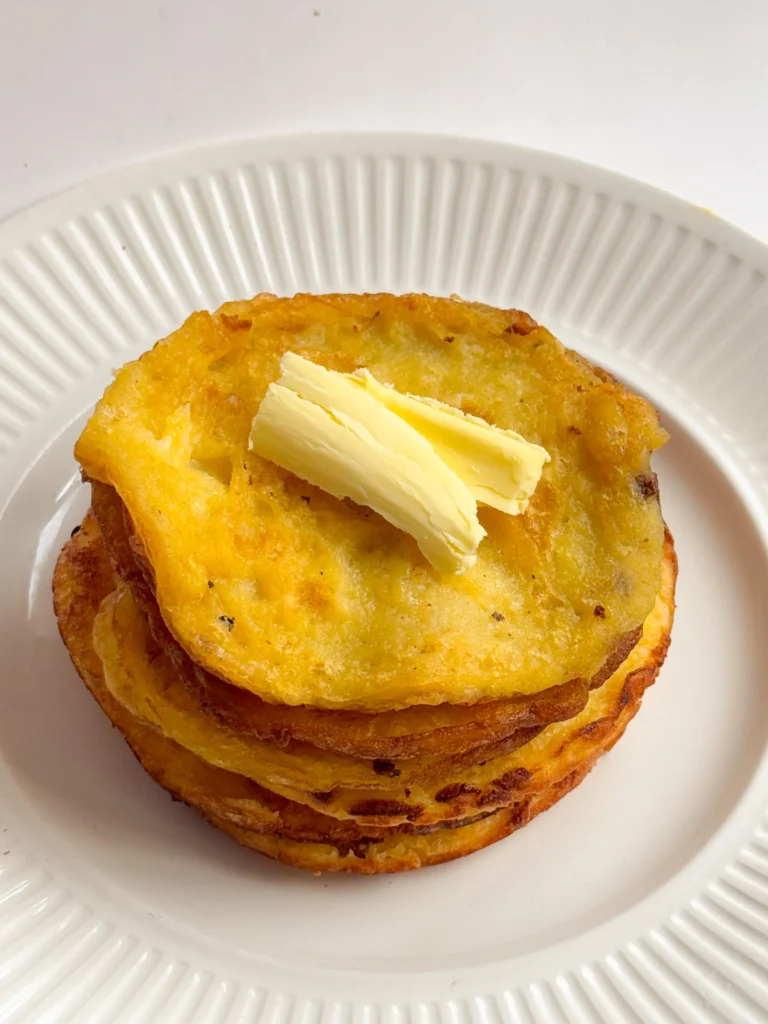 Cover image of a stack of fluffy Greek yogurt pancakes.