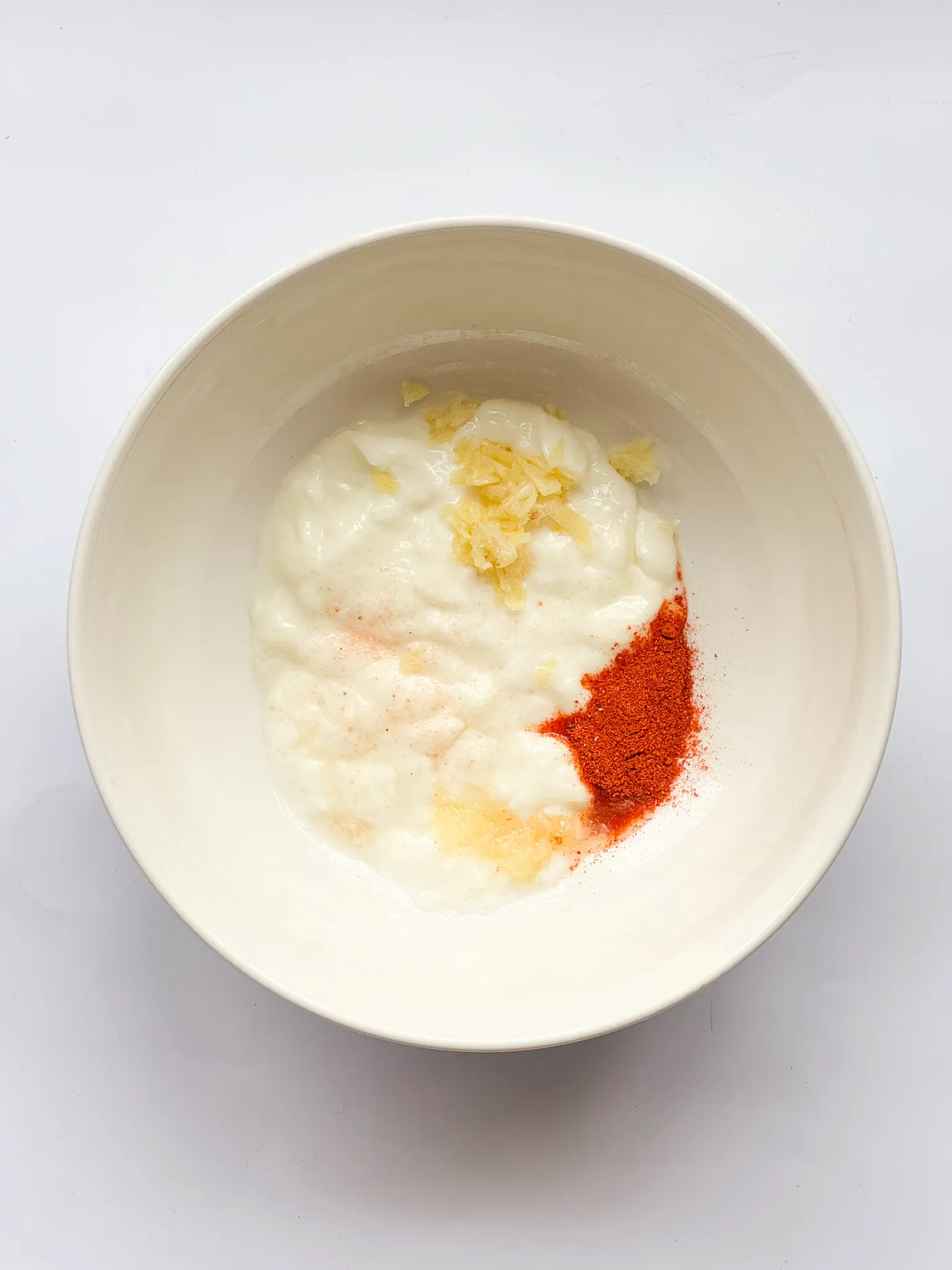 Spicy lime-yogurt dressing; unmixed ingredients.