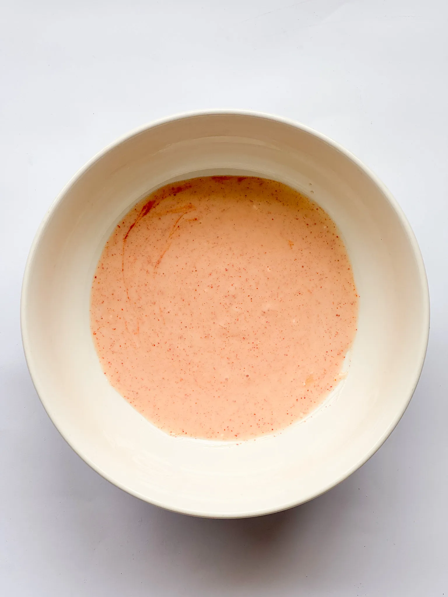 Spicy lime-yogurt dressing; mixed ingredients.