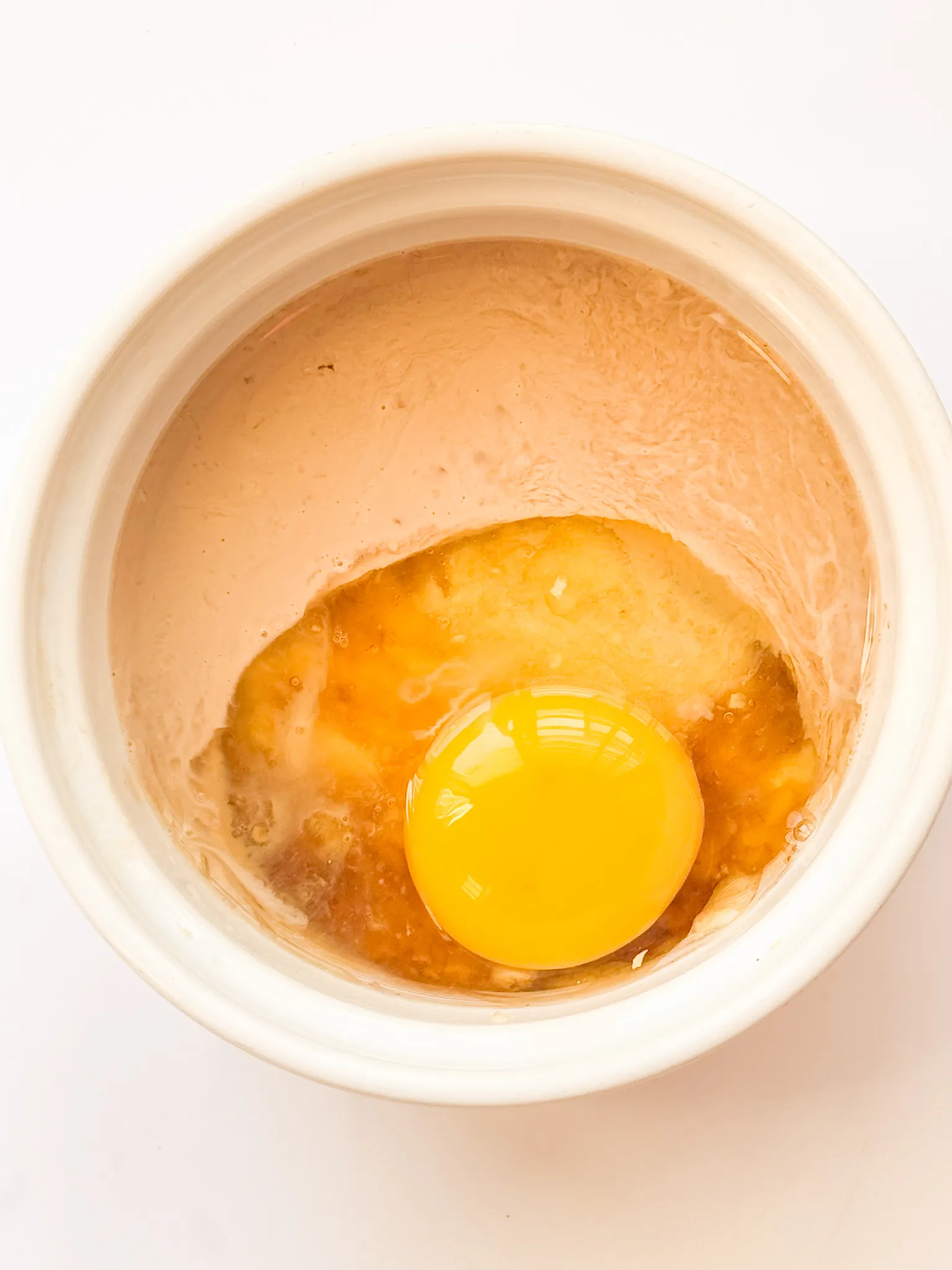Wet ingredients in a bowl.
