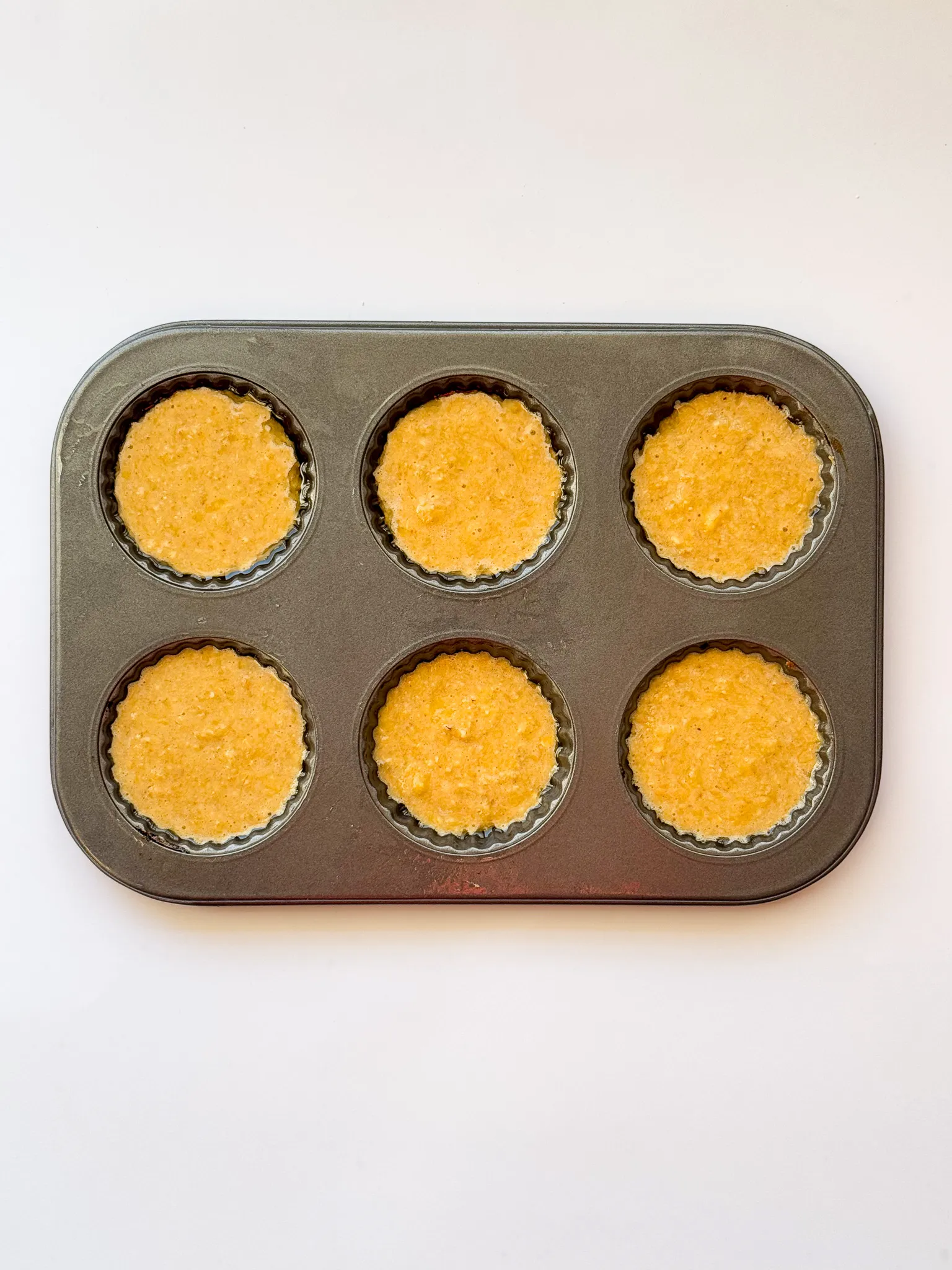 Fill the batter in muffin tray.
