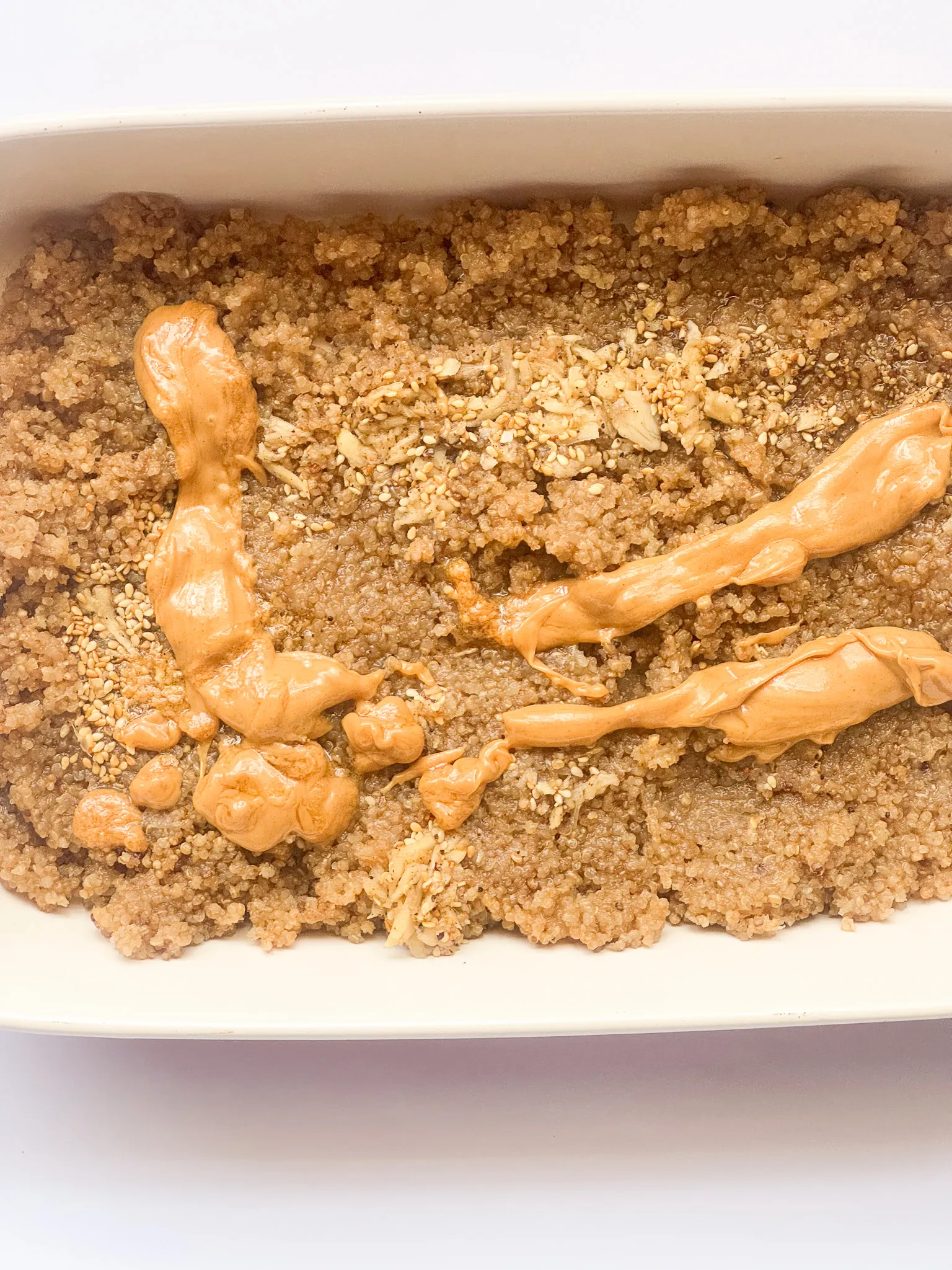 Quinoa base with peanut butter dressing
