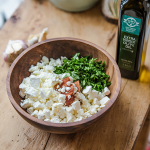 3-minutes feta cheese appetizer with a drizzle of olive oil.