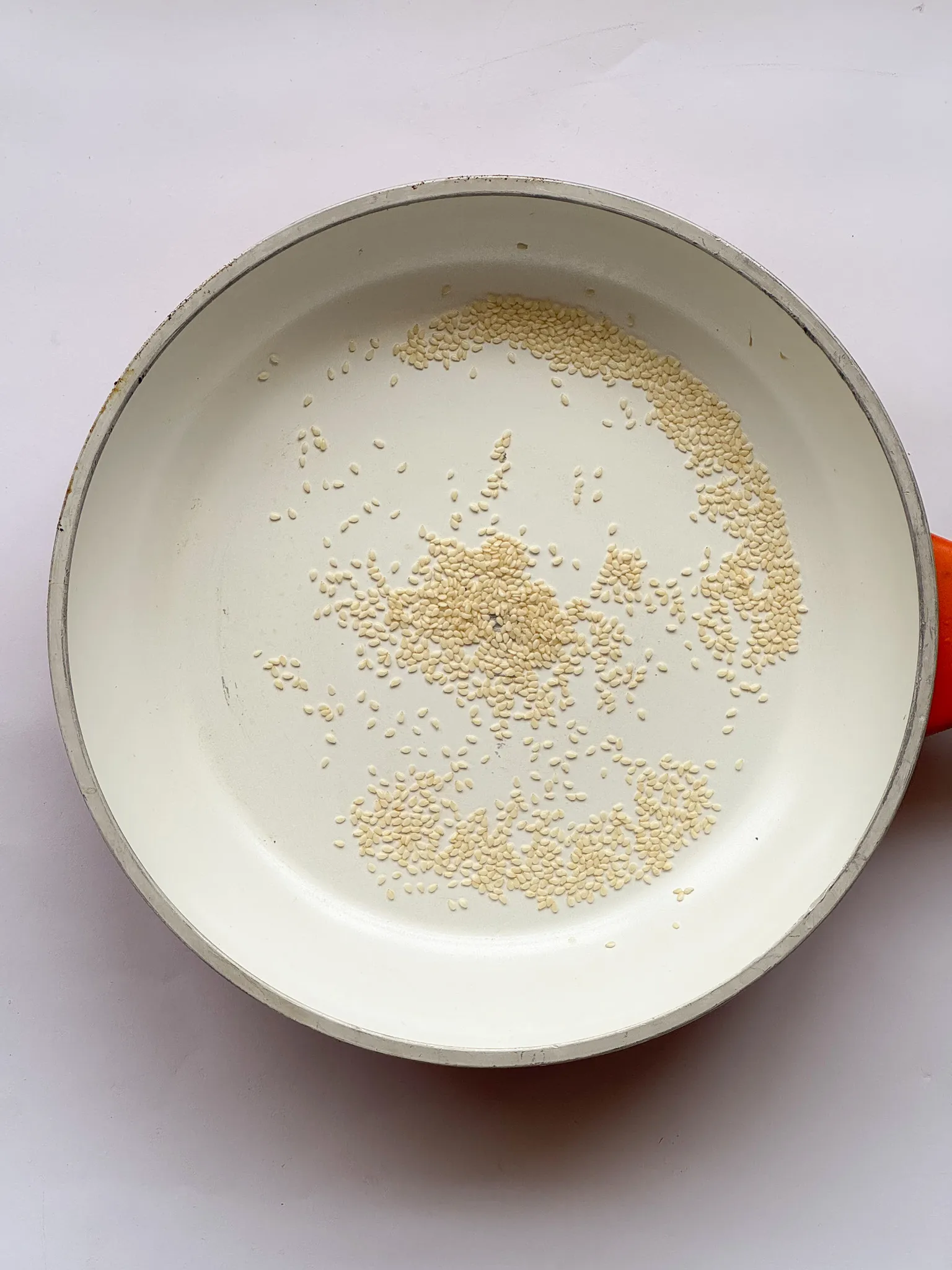 Toasting sesame seeds.