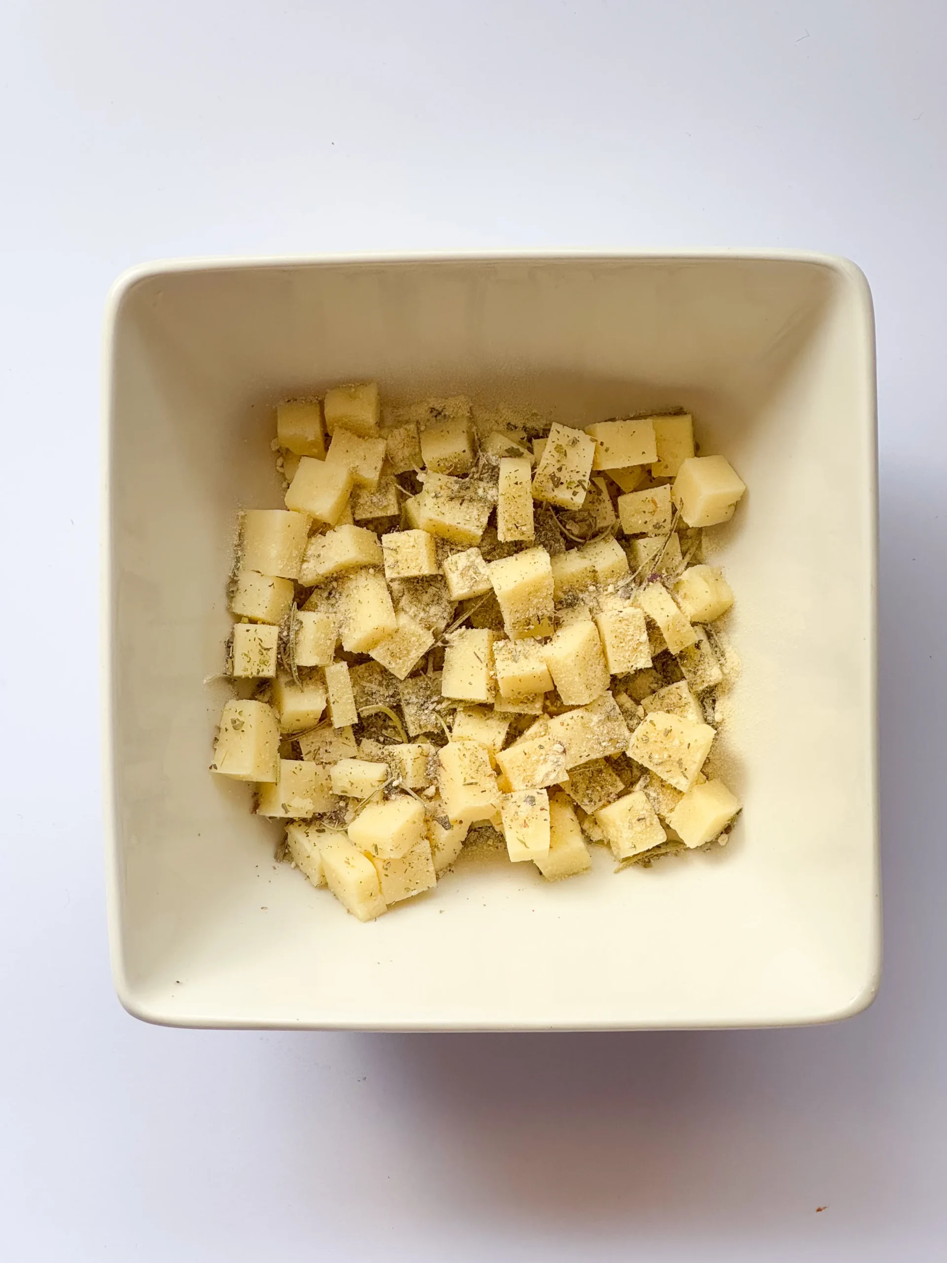 Forming the cottage cheese base with mixed spices.