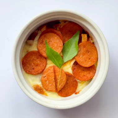 Top-view image of cottage cheese pizza bowl.