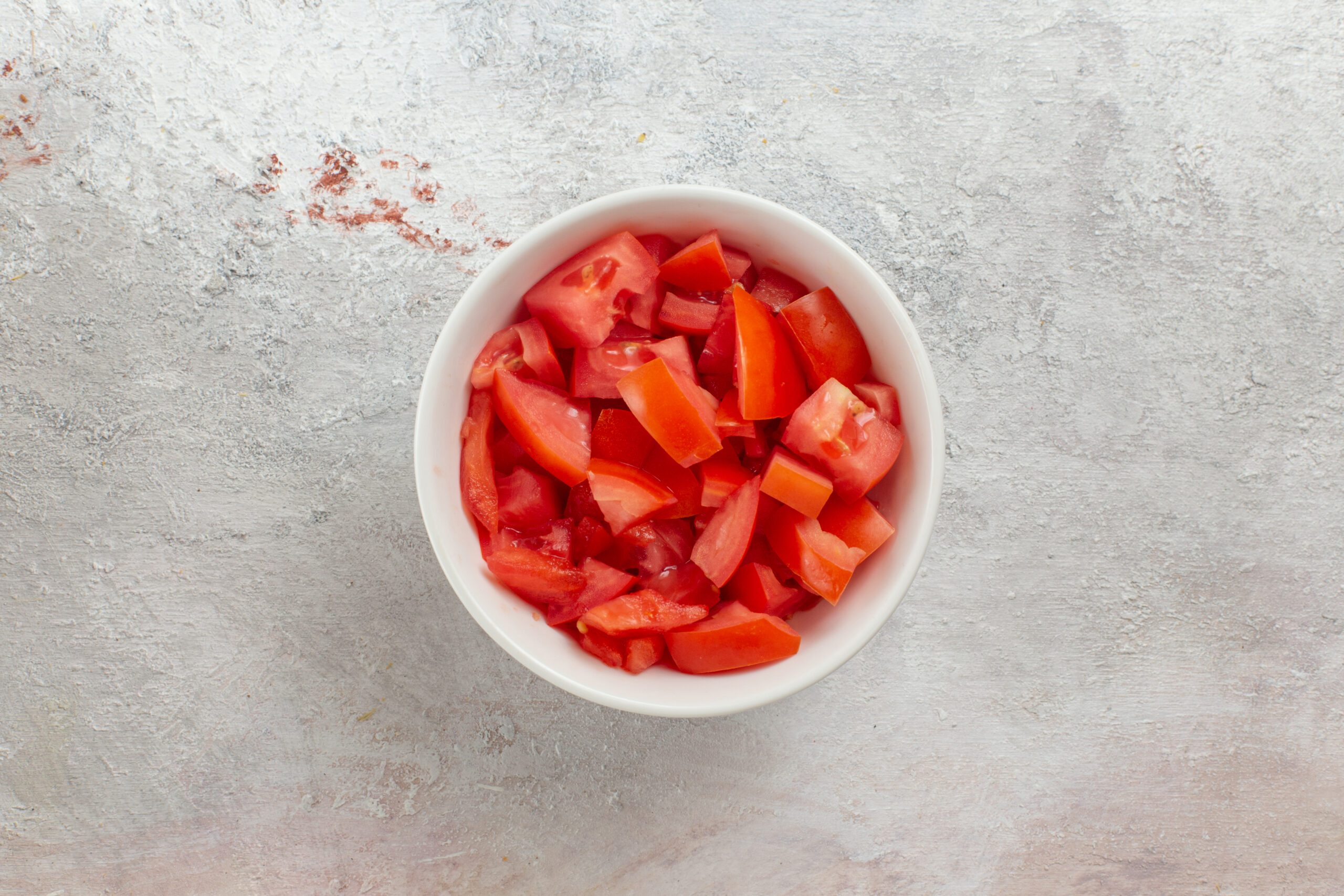top-view-red-bell-pepper-sliced-inside-little-pot-white-surface-vegetable-salad-raw-food-meal-health diced tomatoes