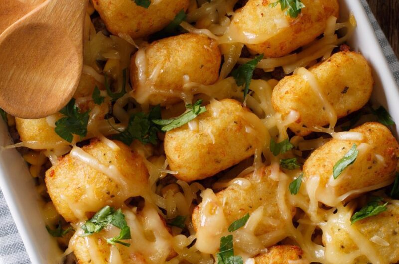 LoadedTater Tots with Cheese, Meat, Corn and Parsley Close-up