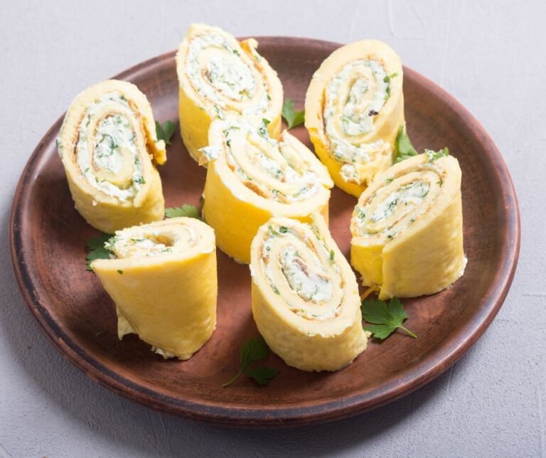 Homemade Eggs Omelet Rolls With Cream Cheese And Parsley