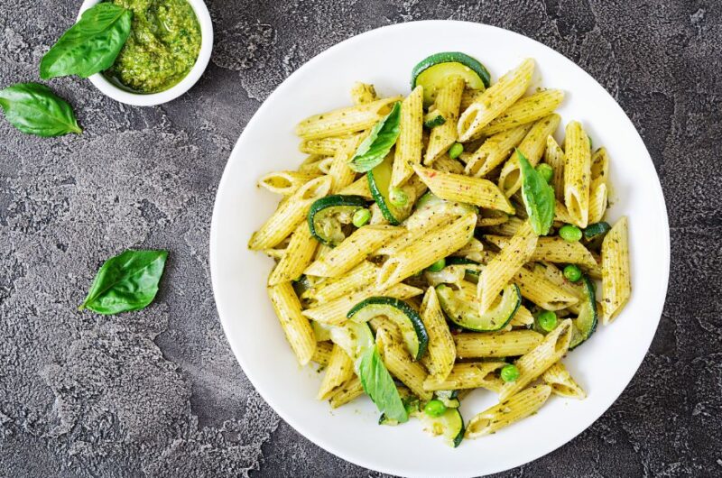 Penne Pasta with Pesto Sauce, Zucchini, Green Peas and Basil