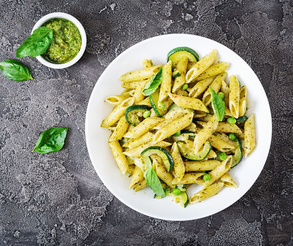Penne Pasta with Pesto Sauce, Zucchini, Green Peas and Basil