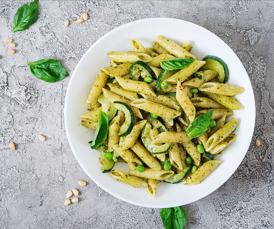 Penne Pasta with Pesto Sauce, Zucchini, Green Peas and Basil
