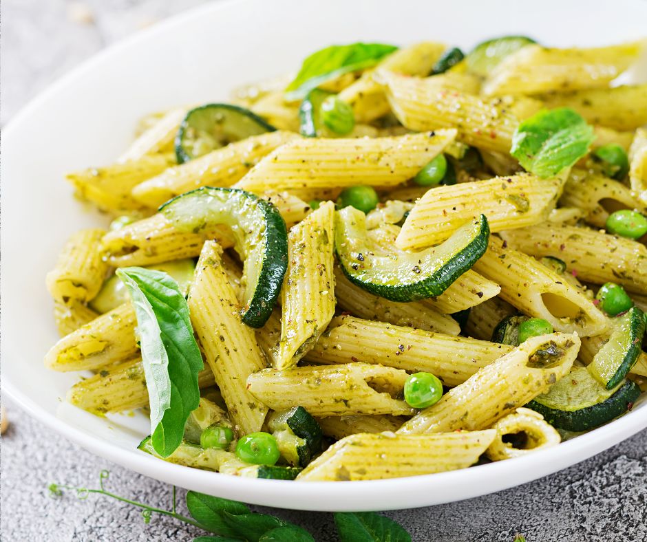Penne Pasta with Pesto Sauce, Zucchini, Green Peas and Basil