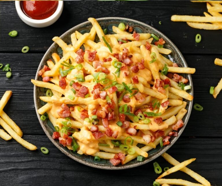 Crispy French Fries Loaded with Bacon, Cheese Sauce and Spring Onion