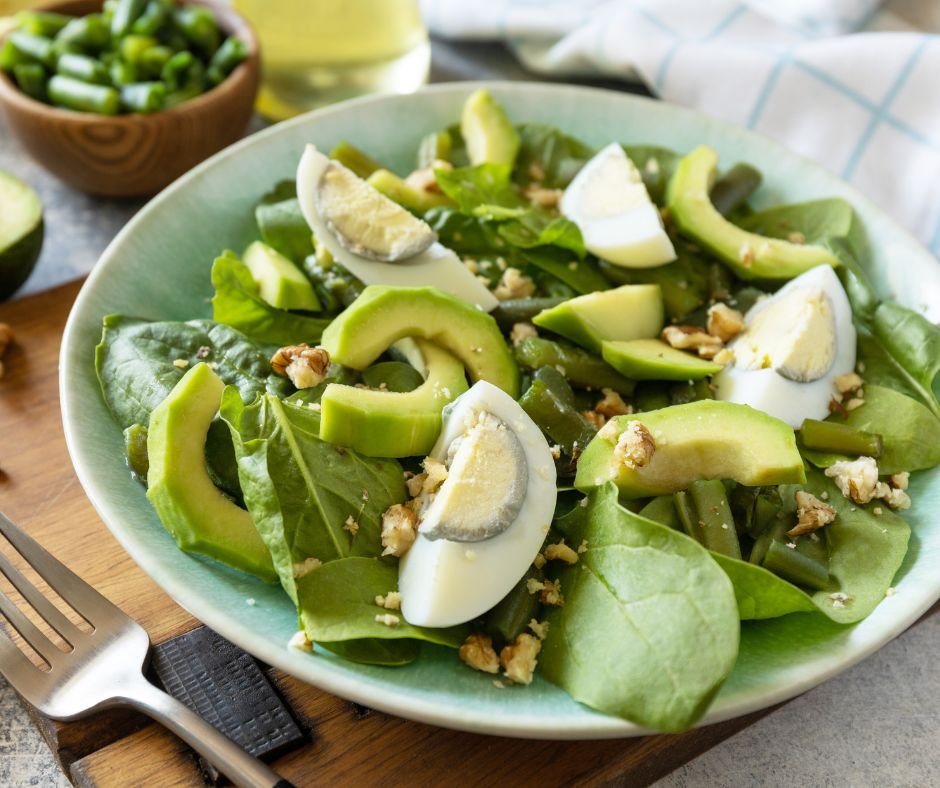 Organic Green Avocado and Spinach Salad with Boiled Eggs, Green Beans and Walnuts