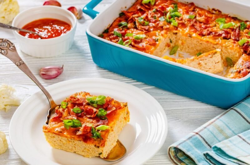 Riced Cauliflower Breakfast Bake with Melted Cheese, Crispy Bacon and Green Onion
