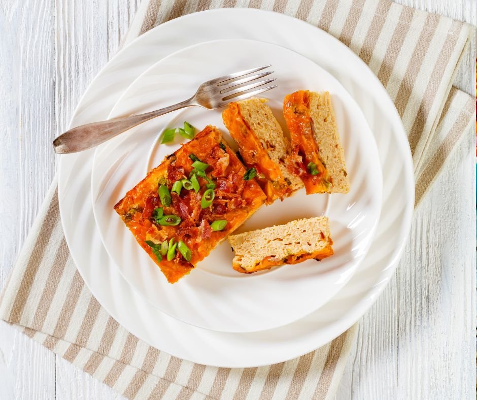 Riced Cauliflower Breakfast Bake with Melted Cheese, Crispy Bacon and Green Onion