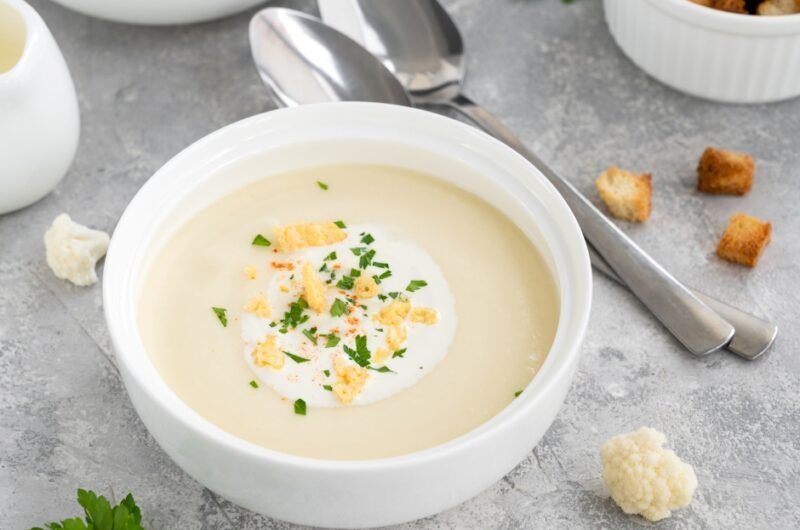 Homemade Cauliflower Soup with Cheese, Cream, Spices and Fresh Parsley