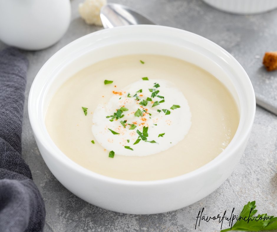 Homemade Cauliflower Soup with Cheese, Cream, Spices and Fresh Parsley