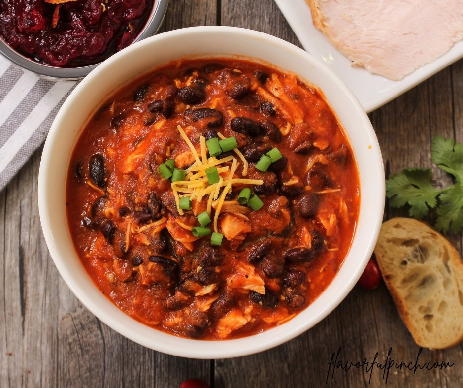 Turkey chili with red beans topped with scallions