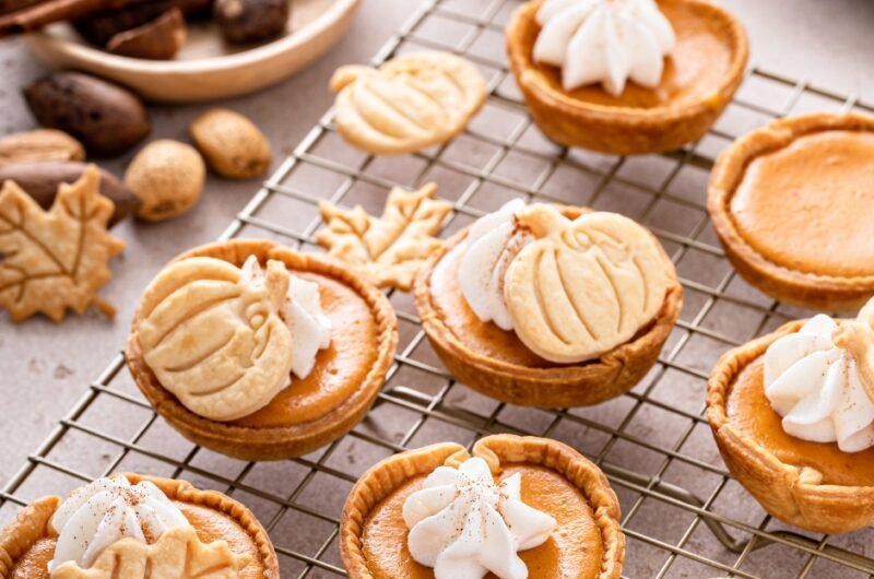 Mini Pumpkin Pies with Whipped Cream and Cinnamon