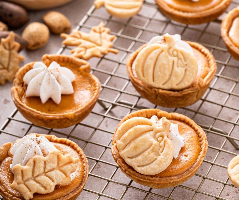 Mini Pumpkin Pies with Whipped Cream and Cinnamon