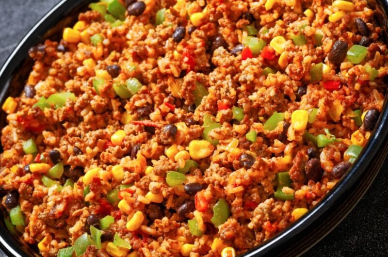 Mexican Ground Beef Casserole with Rice, Beans, Corn, Bell Pepper and Tomatoes