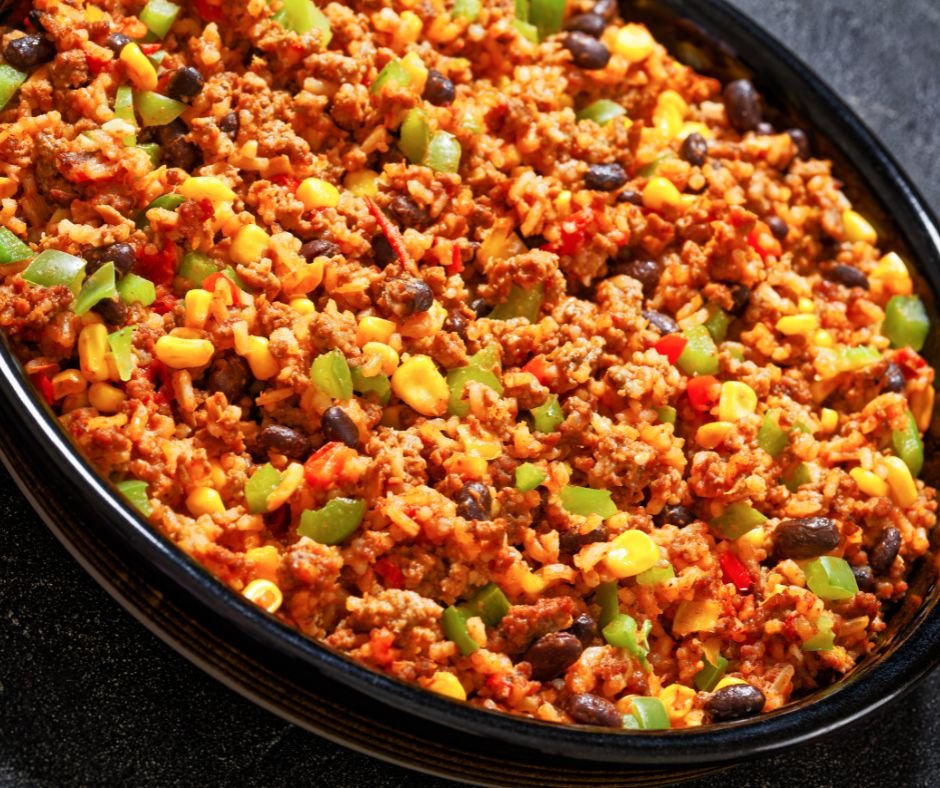 Mexican Ground Beef Casserole with Rice, Beans, Corn, Bell Pepper and Tomatoes