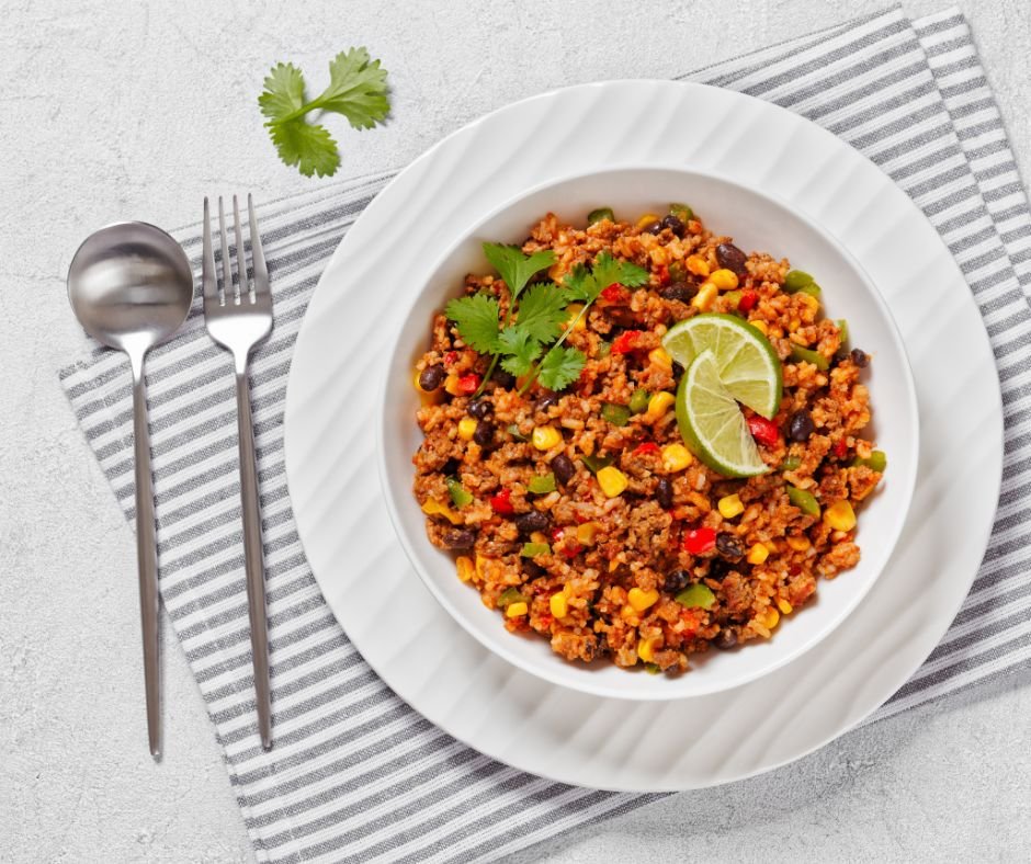 Mexican Ground Beef Casserole with Rice, Beans, Corn, Bell Pepper and Tomatoes
