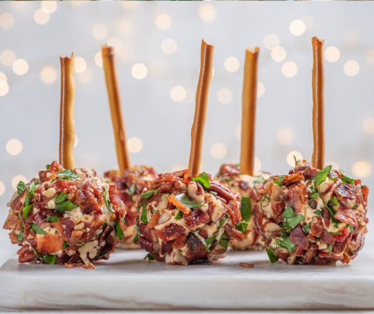 Individual Christmas Cheese Ball Appetizers on Pretzel Sticks