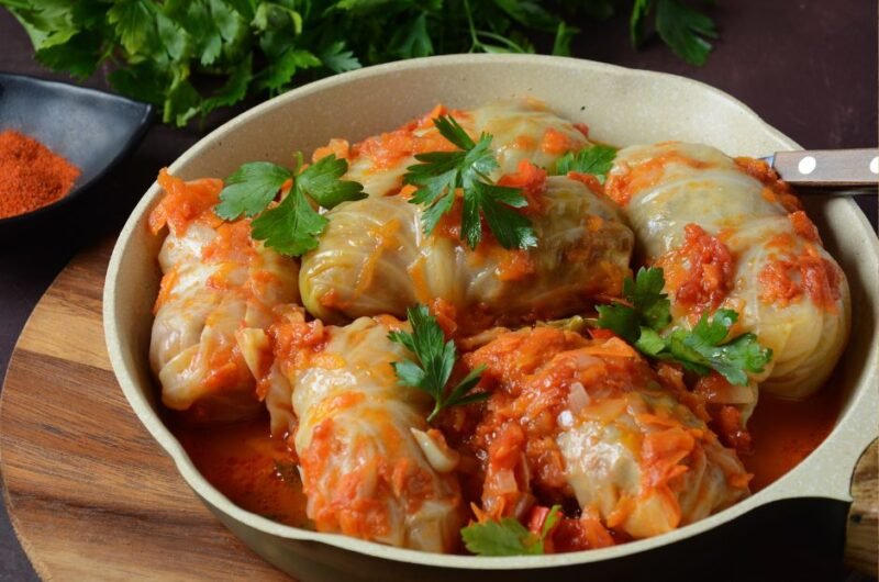 Stuffed Cabbage Rolls with Rice and Ground Beef in Tomato Sauce